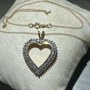 10 k Gold Diamond Heart Pendant on a 18” chain